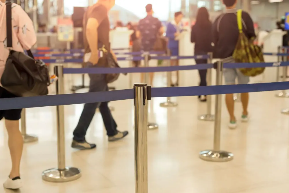 Passengers waiting in line at airport